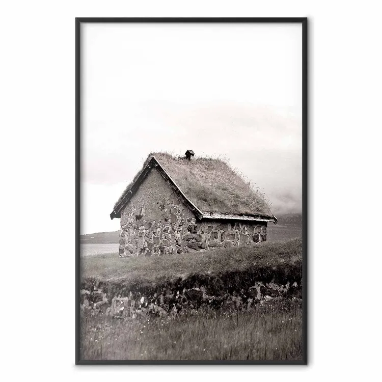 Fischerhütte - Feld und Haus vor klarem Himmel