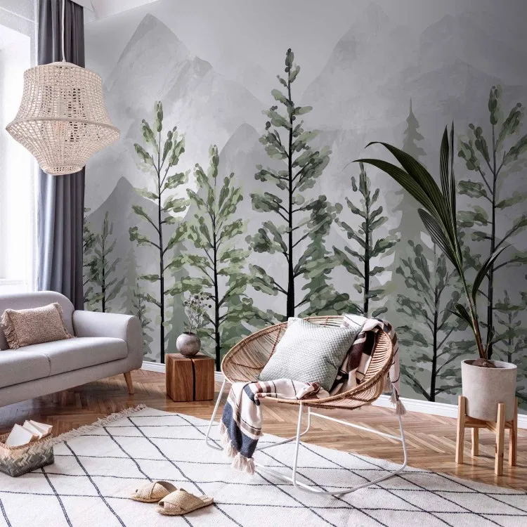 Berglandschaft - Hohe grüne Bäume vor spitzen grauen Bergen