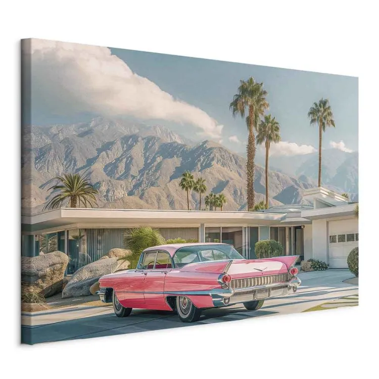 Retro-Cadillac - Oldtimer vor einer Kulisse aus Bergen und Palmen