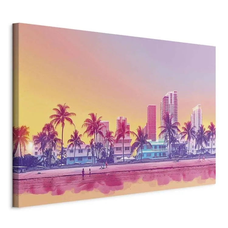 Neon-Strand - bunte Gebäude und Palmen bei Sonnenuntergang